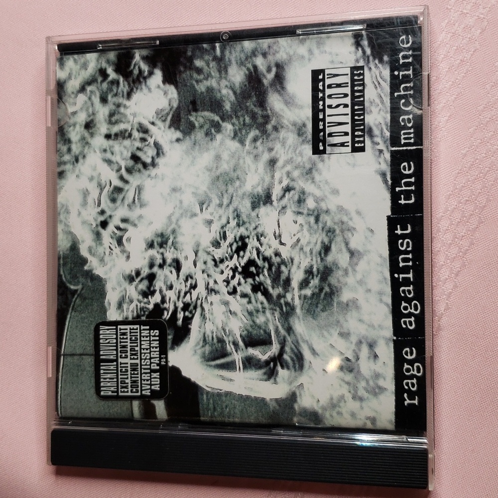 Rage Against the Machine CD with leaflet booklet